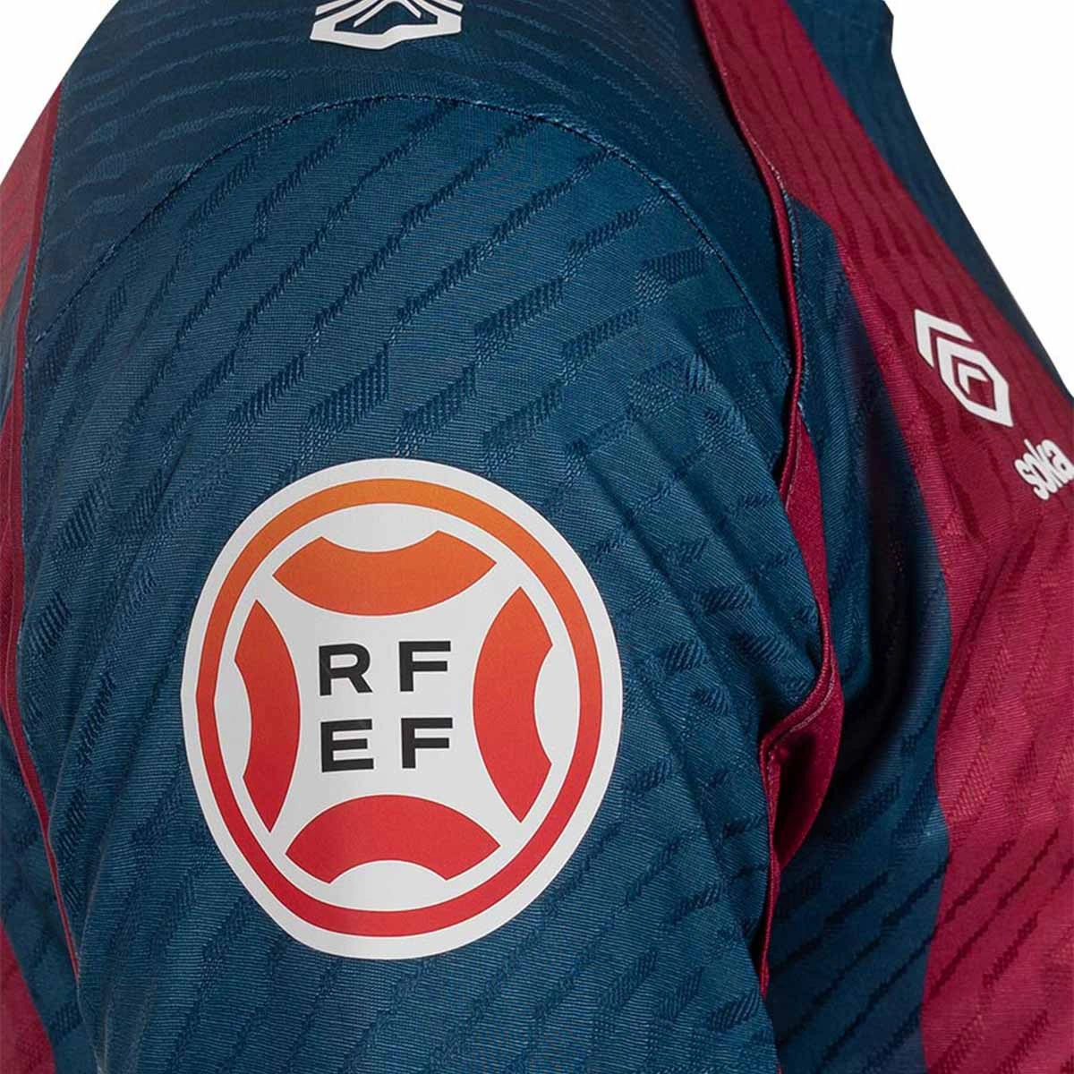camiseta-soka-sd-huesca-primera-equipacion-nino-2026-2027-sdh-blue-sdh-red-6