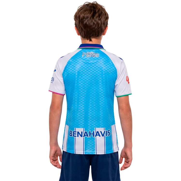 camiseta-hummel-malaga-cf-primera-equipacion-2026-2027-nino-blue-white-1